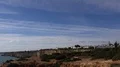 Cliffs and landscape pan with beautiful cloudscape at Algarve coastline Portugal 4k or 4k+ Resolution