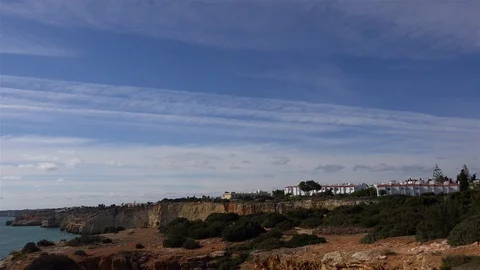 Cliffs and landscape pan with beautiful cloudscape at Algarve coastline Portugal Stock Footage 108981696