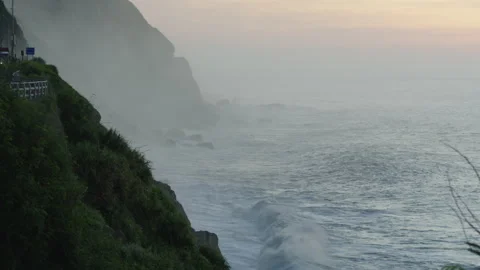 Cliffs and ocean wave in golden sunrise light. Stock Footage 340045699