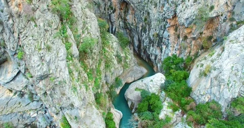 Cliffs and Riverbed 4k Aerial View Stock Footage 148411819
