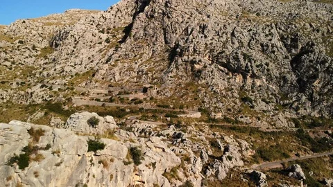 Cliffs and rocked mountains. 4K UHD aerial drone view, zoom out Stock Footage 122223435