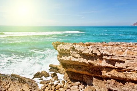 Cliffs and rocks on the Atlantic ocean coast in Sintra in a beautiful summe.. Stock Photos