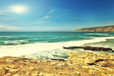 Cliffs and rocks on the Atlantic ocean coast in Sintra in a beautiful summer Stock Photos