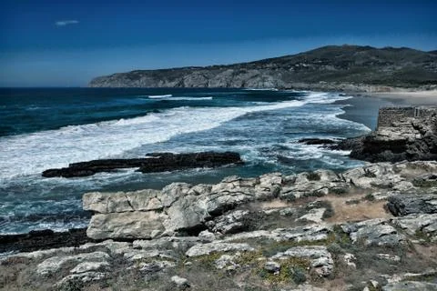 Cliffs and rocks on the Atlantic ocean coast in Sintra . Portugal Stock Photos