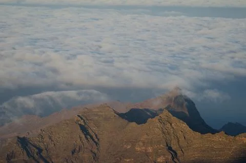 Cliffs and sea of clouds. Stock Photos
