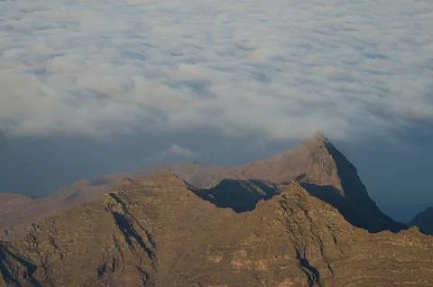 Cliffs and sea of clouds. Stock Photos