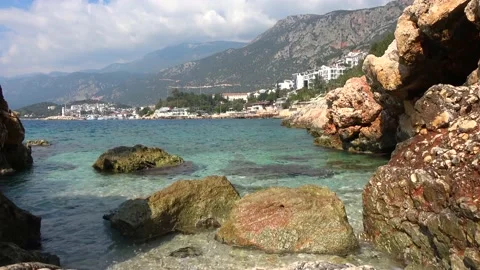 Cliffs and a seaside town across the bay Stock Footage 171053149