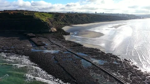 Cliffs and shining beach at low tide near Boulogne-sur-Mer, aerial Stock Footage 347177536