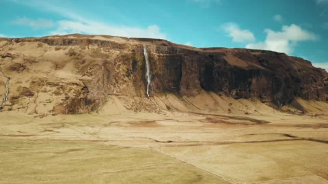 Cliffs and waterfall in Iceland Stock Footage 154842571