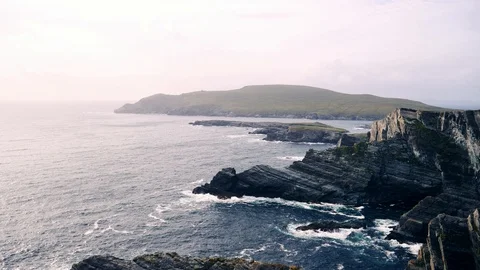 Cliffs and waves at the Irish coast on a foggy day Stock Footage 96388384