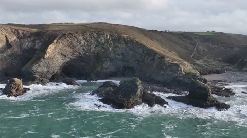 Cliffs and Waves in Slow Motion, St. Agnes Heritage Coast, Saint Agnes, Cornwall Stock Footage 228472303