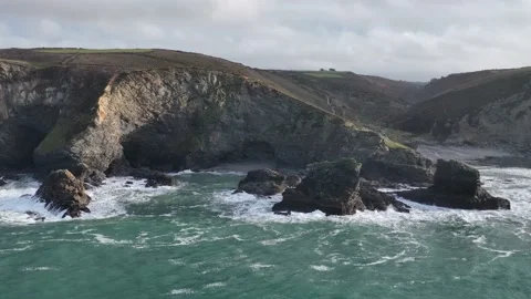 Cliffs and Waves in Slow Motion, St. Agnes Heritage Coast, Saint Agnes, Cornwall Stock Footage 228472395