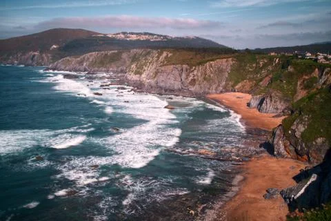 Cliffs and wild beach Stock Photos