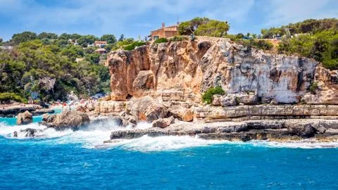 Cliffs around beach, Cala Llombards in Mallorca, Balearic Island, Spain Stock Photos