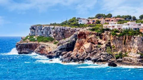 Cliffs around beach, Cala Llombards in Mallorca, Balearic Island, Spain Stock Photos