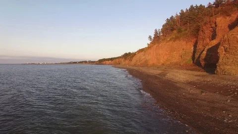Cliffs &amp; Beach at Sunset- Arisaig Provincial Park, Nova Scotia Stock Footage 90587883