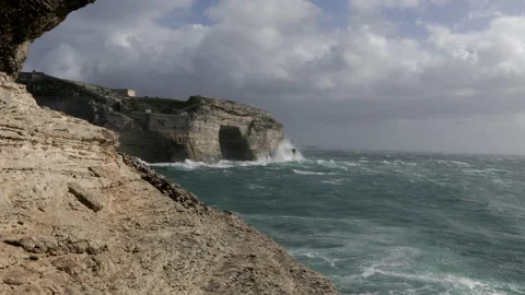 Cliffs of Bonifacio with stormy sea and giant waves Stock Footage