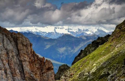 Cliffs of Carnic Alps with ridges and glaciers of Hohe Tauern Stock Photos