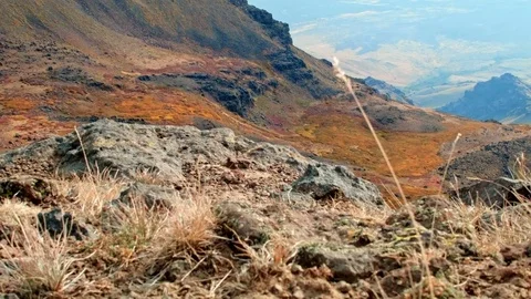 Cliffs edge dynamic rocks and grass Summit Steens Mountain Near Malhuer Wildlife Video stock 81605264