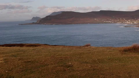 Cliff's Edge Oceanscape with Mountains. Achill Island, Ireland. Stock-Footage 239496190