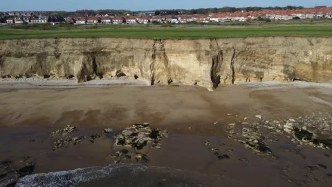 Cliffs on the English beach from a drone Stock Footage 188813974