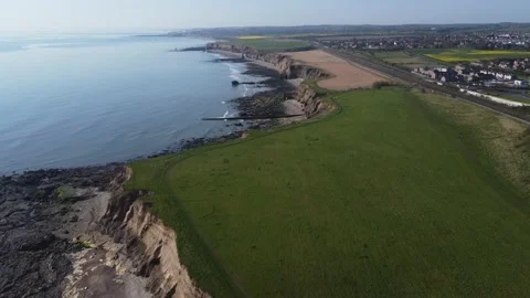 Cliffs on the English beach from a drone Stock Footage 188821422