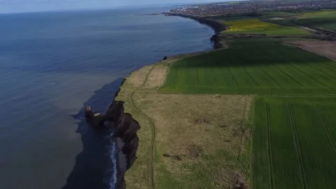 Cliffs on the English beach from a drone Stock Footage 188863643
