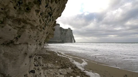 Cliffs of Etretat with sea foam Normandy, France Stock Footage 112749429