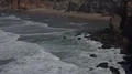 Cliffs with foamy sea and beach at Portugal southern tourism spot Sagres 4k 4k or 4k+ Resolution