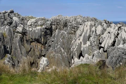 The Cliffs of Hell with beautiful rock formations and coves in Ribadesella .. Fotos Stock