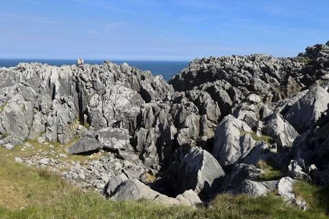 The Cliffs of Hell with beautiful rock formations and coves in Ribadesella .. Fotos Stock