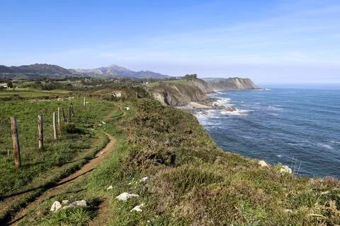 The Cliffs of Hell with beautiful rock formations and coves in Ribadesella .. Stock Photos