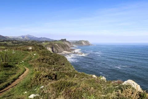 The Cliffs of Hell with beautiful rock formations and coves in Ribadesella .. Stock Photos