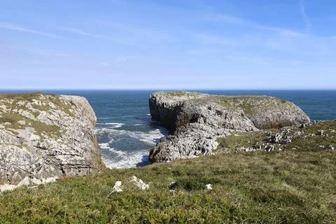 The Cliffs of Hell with beautiful rock formations and coves in Ribadesella .. Fotos Stock