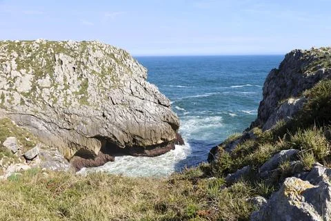 The Cliffs of Hell with beautiful rock formations and coves in Ribadesella .. Fotos Stock