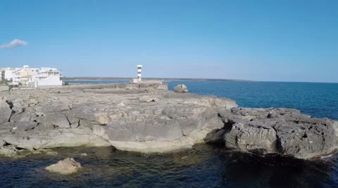 Cliffs &amp; historic Lighthouse - Aerial Flight Stock Footage 52460399