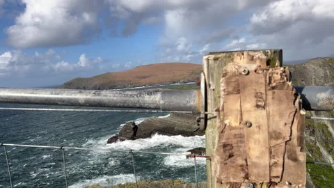 Cliffs of Kerry Camera pushes in over fence to the beautiful ocean view Stock Footage 255200340