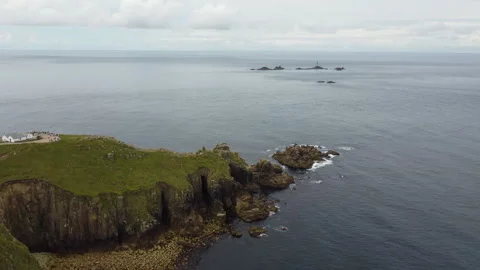 Cliffs off of Lands end with big waves and stunning scenery Cornwall UK Stockbeeldmateriaal 262657018