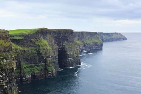 Cliffs of moher and atlantic ocean. Stock Photos