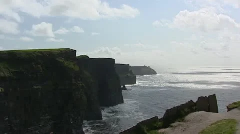 Cliffs of Moher at Atlantic ocean + zoom in steep wall Stock Footage 21275828
