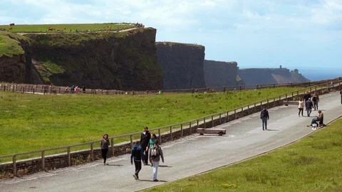 Cliffs of Moher, County Clare / Ireland: tourists visiting the cliffs Stock Footage 101642669