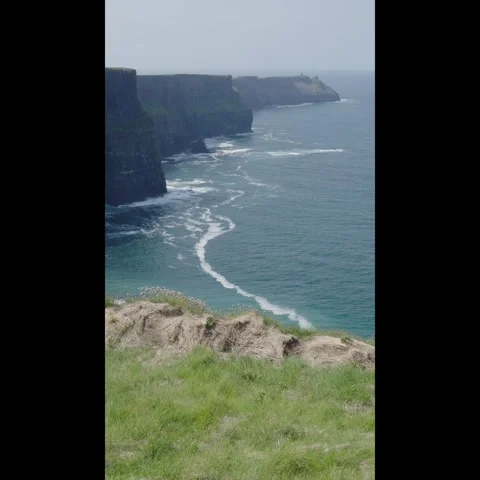 Cliffs of Moher. Dramatic coastal cliffs along the rugged Atlantic coast in Stock Footage 311756233