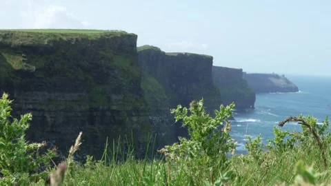 Cliffs of Moher. Dramatic coastal cliffs rise steeply from the Atlantic Ocean Stock-Footage 311756991