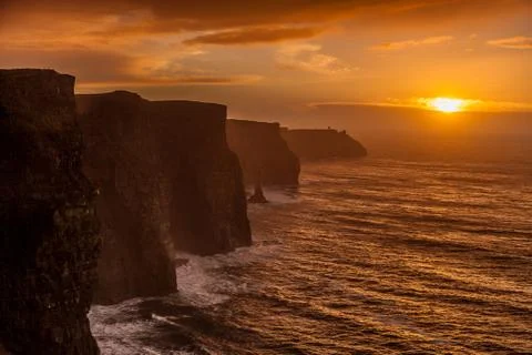 Cliffs of moher at sunset in co. clare, ireland europe Stock Photos