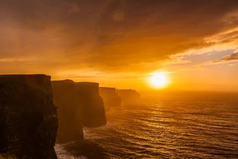 Cliffs of moher at sunset in co. clare, ireland europe Stock Photos