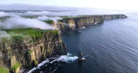 Cliffs of Moher off the west coast of Ireland shrouded in low clouds. 스톡 동영상 252577536