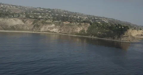 Cliffs near ocean cliffs, overcast day, aerial Stock Footage 105975428