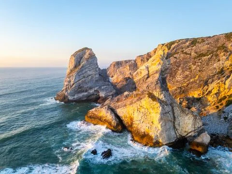 Cliffs near Ursa Beach at Sunset. Portugal. Aerial View Stock Photos