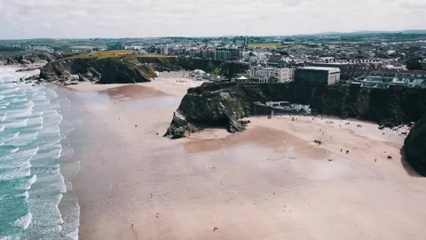 Cliffs At Newquay Beach By Drone Stock Footage 299333601