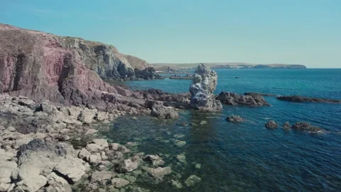 Cliffs over Bantham Beach and River Avon from a drone, South Hams, Devon 動画素材 203826822